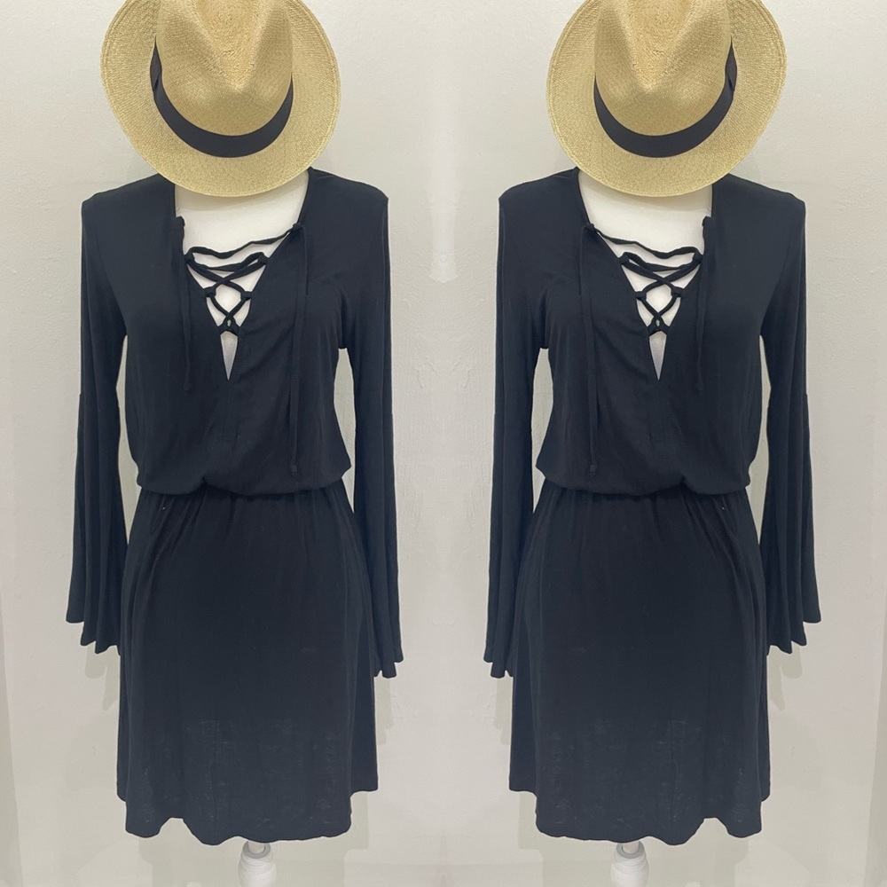 Black long sleeves cotton like black dress.